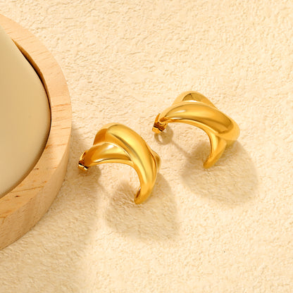 Wholesale Waterproof 18K PVD Two-Tone Smooth C Hoop EarringsClose-up of the light-colored ambiance