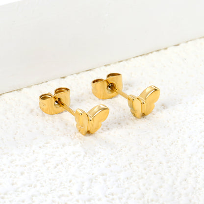 Wholesale stainless steel 18K gold plated butterfly regular pin earringsClose-up of the light-colored ambiance