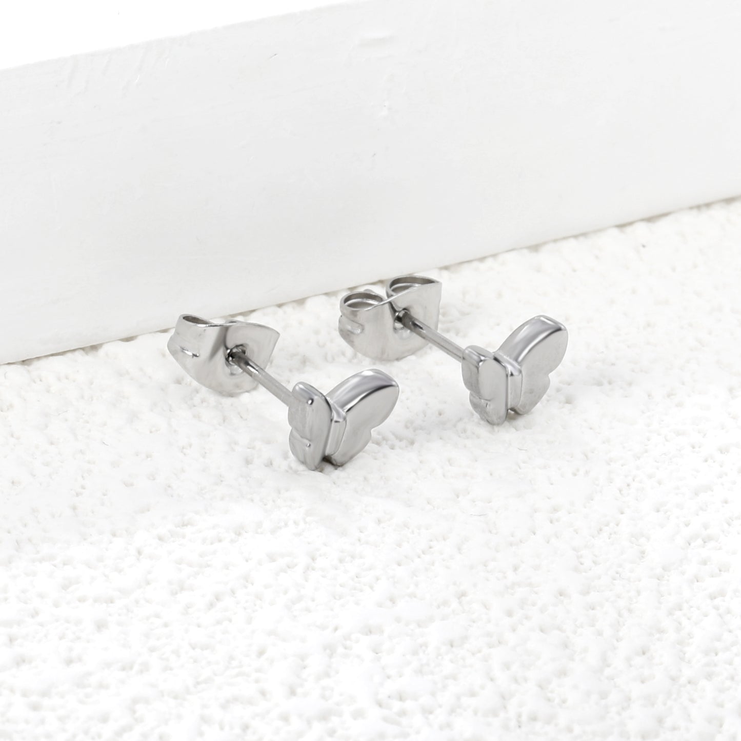 Wholesale stainless steel 18K gold plated butterfly regular pin earringsHigh-resolution Lifestyle Photos_silver