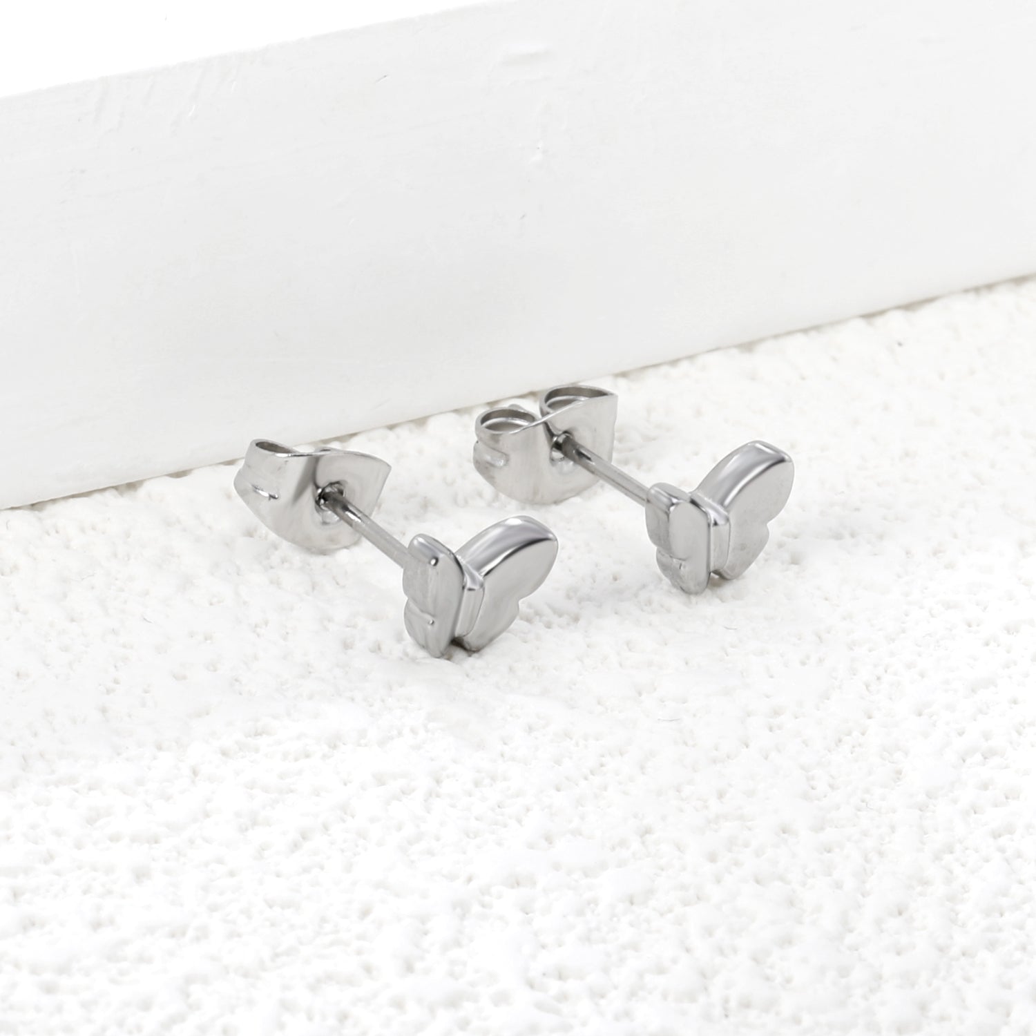 Wholesale stainless steel 18K gold plated butterfly regular pin earringsHigh-resolution Lifestyle Photos_silver