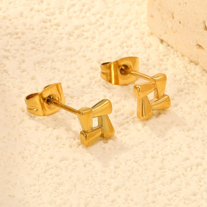 Wholesale stainless steel 18K gold plated openwork quadrilateral plain pin earringsClose-ups of the gold plating and details