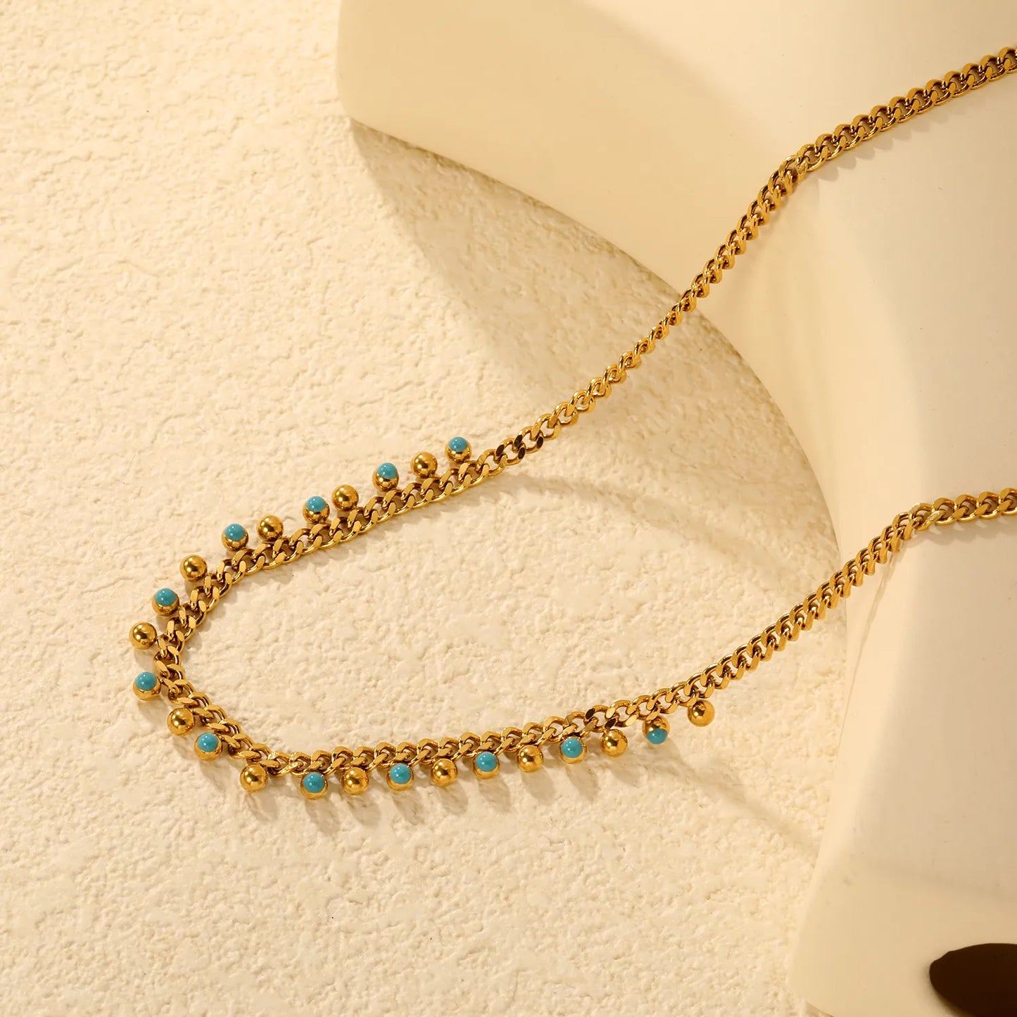 Wholesale Waterproof PVD Gold Sculpted Blue Bead Cuban Link Necklace