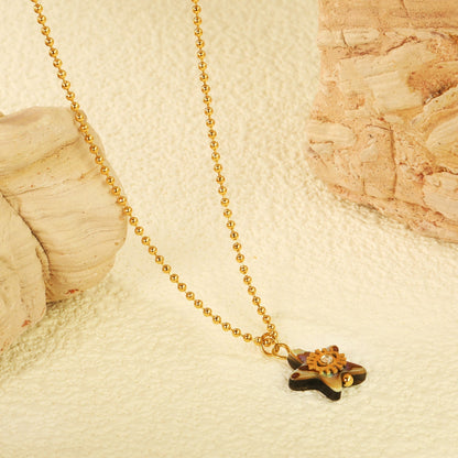 Embrace Coastal Mystique with an Iridescent Abalone Shell Star Eye Chain