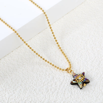 Embrace Coastal Mystique with an Iridescent Abalone Shell Star Eye Chain