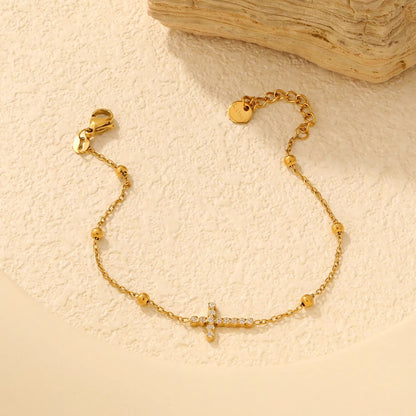 Gentle Faith: Mirror-Polished Gold Beads & Pave CZ Cross Bracelet