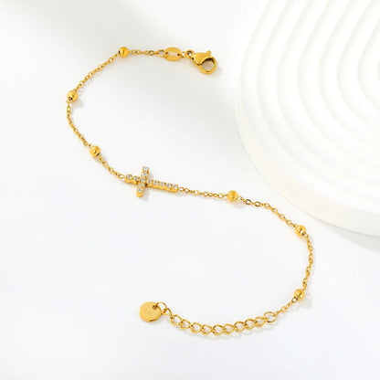 Gentle Faith: Mirror-Polished Gold Beads & Pave CZ Cross Bracelet