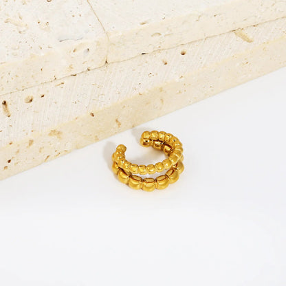 Modern Geometric Tactile Vibe Featuring Double Rows of Polished Gold Cubes Rings