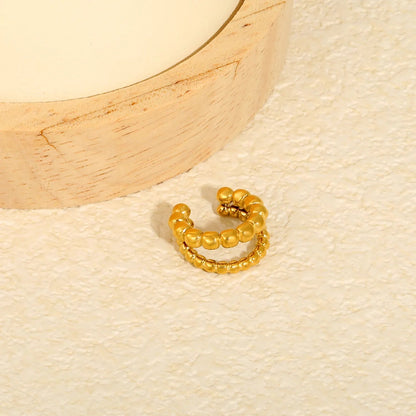 Modern Geometric Tactile Vibe Featuring Double Rows of Polished Gold Cubes Rings