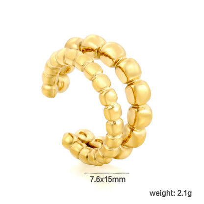 Modern Geometric Tactile Vibe Featuring Double Rows of Polished Gold Cubes Rings
