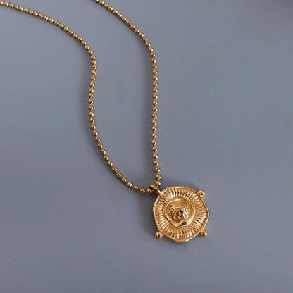 Wholesale Waterproof PVD Gold Relief-Textured Sun Badge Necklace