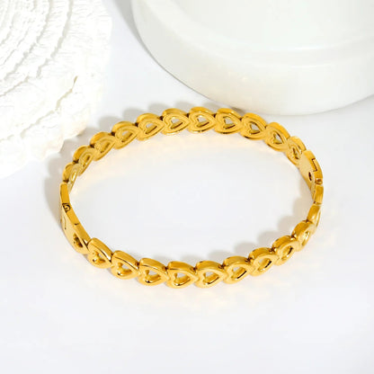 Romantic Whispers: Delicate Continuous Cutout Heart Hinged Bangle