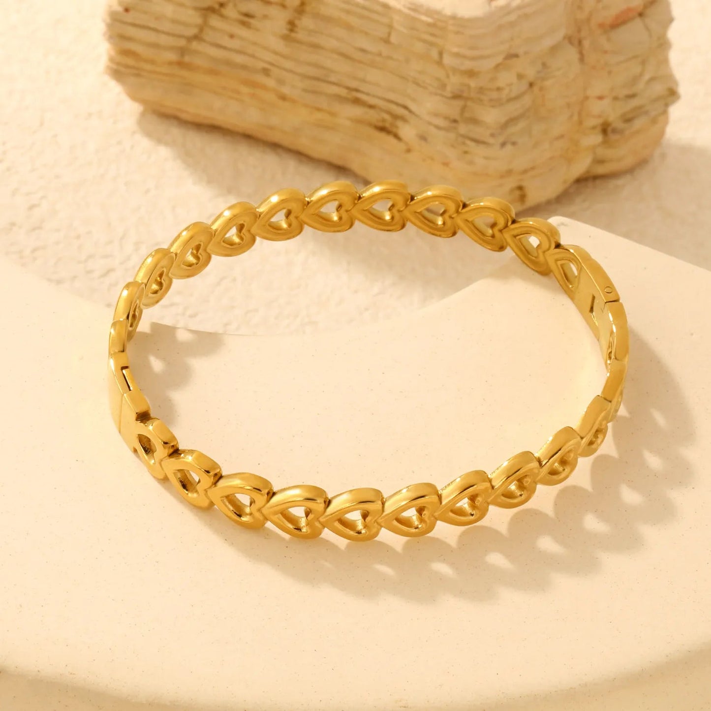Romantic Whispers: Delicate Continuous Cutout Heart Hinged Bangle