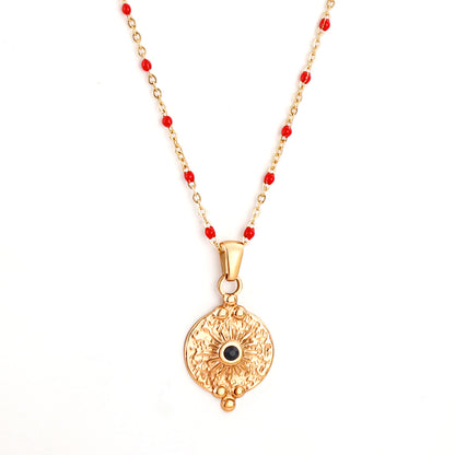 onyx-medallion-ruby-beads-18kgold