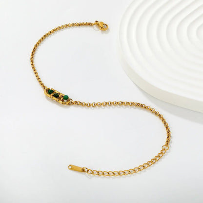 Channel Vintage French Elegance with Rich Emerald Green Beads Encased in Gold