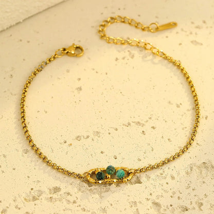 Channel Vintage French Elegance with Rich Emerald Green Beads Encased in Gold