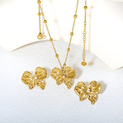 Elevate Your Date Night Look with an Elegant Ribbon Bow Pearl Duo