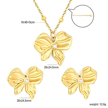 Elevate Your Date Night Look with an Elegant Ribbon Bow Pearl Duo