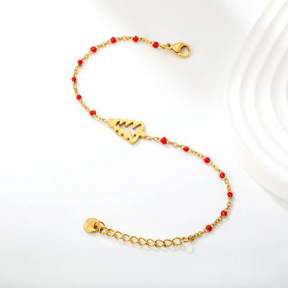 Embrace Festive Holiday Cheer with a Vibrant Red Beaded Christmas Tree Bracelet