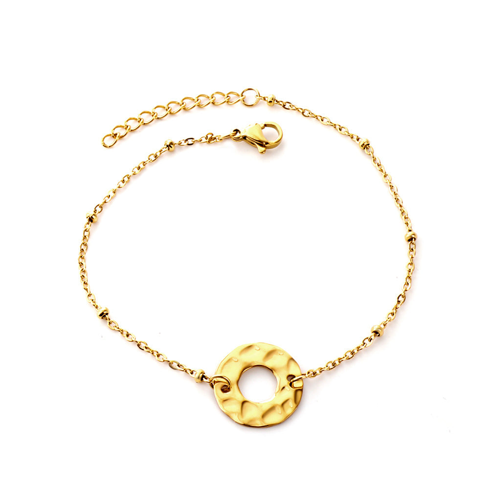 round-cutout-charm-bracelet-18kgold