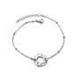 round-cutout-charm-bracelet-silver