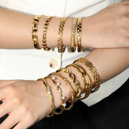 Verified Supplier 18K Gold Plated Spring Clasp Wave CZ Bangle Wholesale